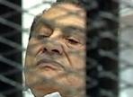 Mubarak Put on Trial Inside Wire Cage
